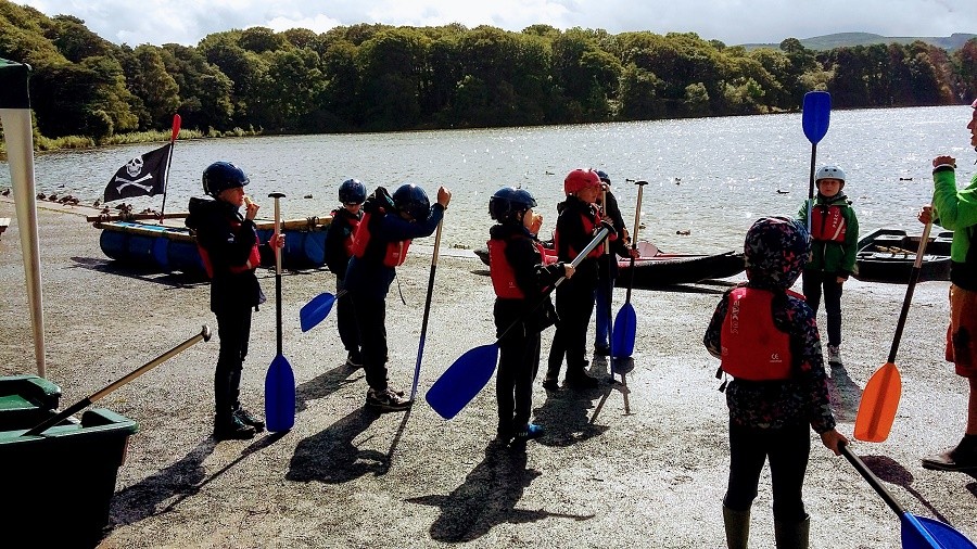 school group canoeing at Talkin Tarn